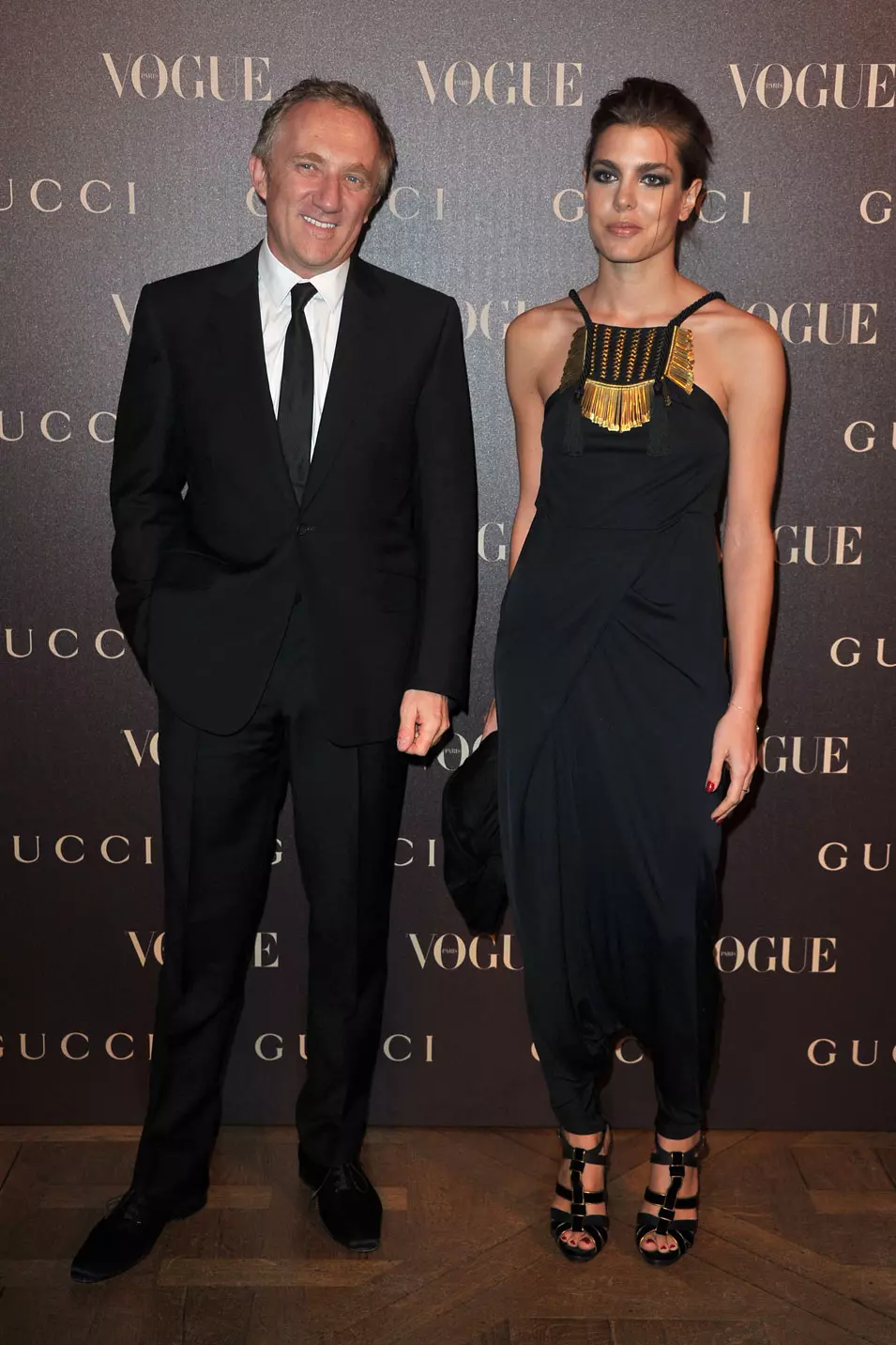 שרלוט קסיריאגי נסיכת מונקו ופרנסווה אנרי פינו בדינר שאירחה קארין רויטפלד לכבודה של פרידה ג'אניני בעת שבוע האופנה של פריז, 25 ינואר 2011