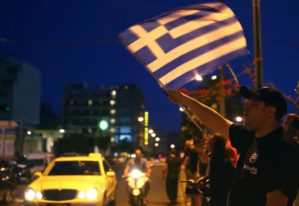 צוות ההיערכות מעריך כי מיתון באירופה הוא כבר ודאי. הפגנה ביוון
