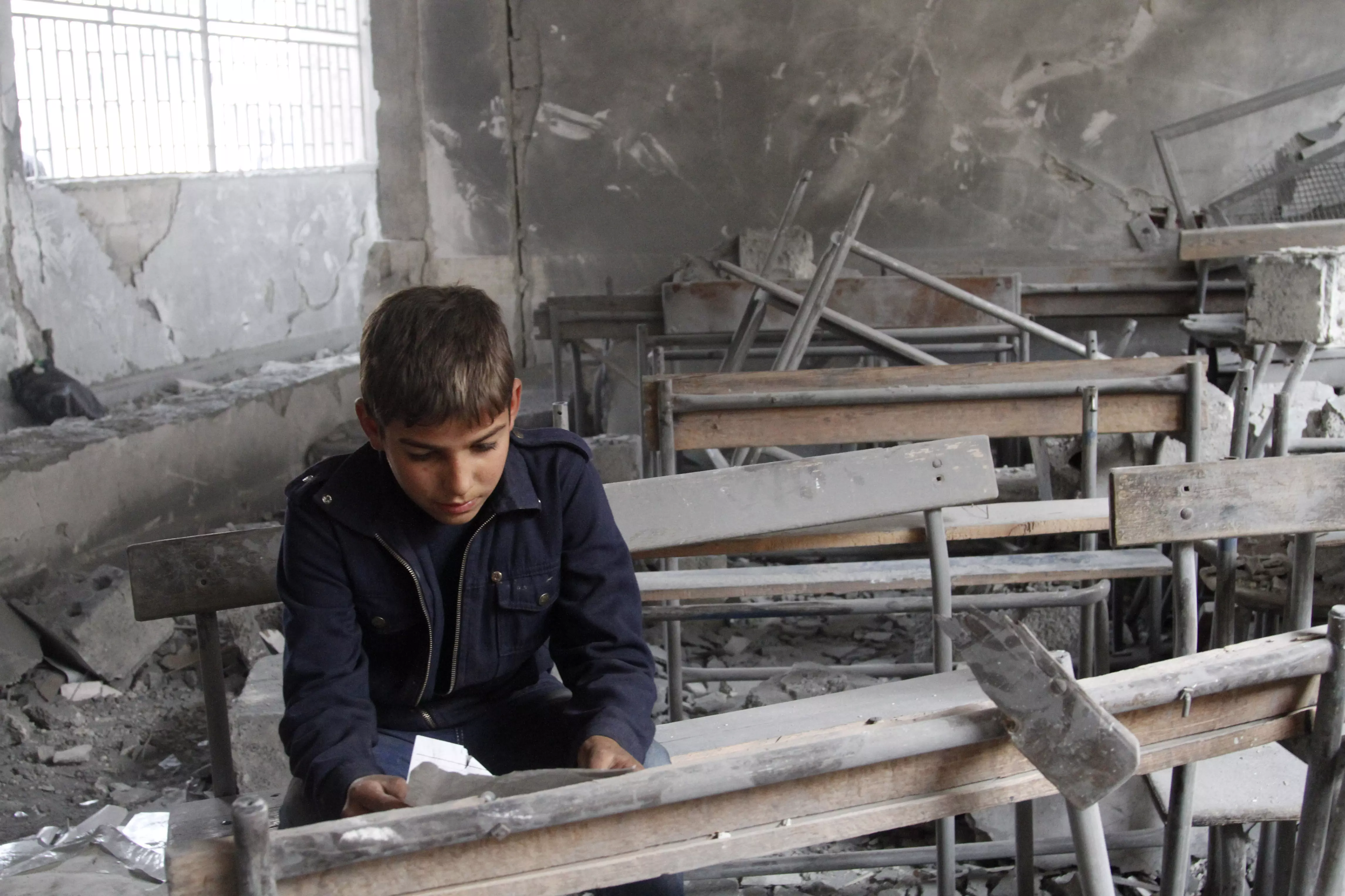 תלמיד סורי בבית ספר שהופגז בעיר חלב, נובמבר 2012