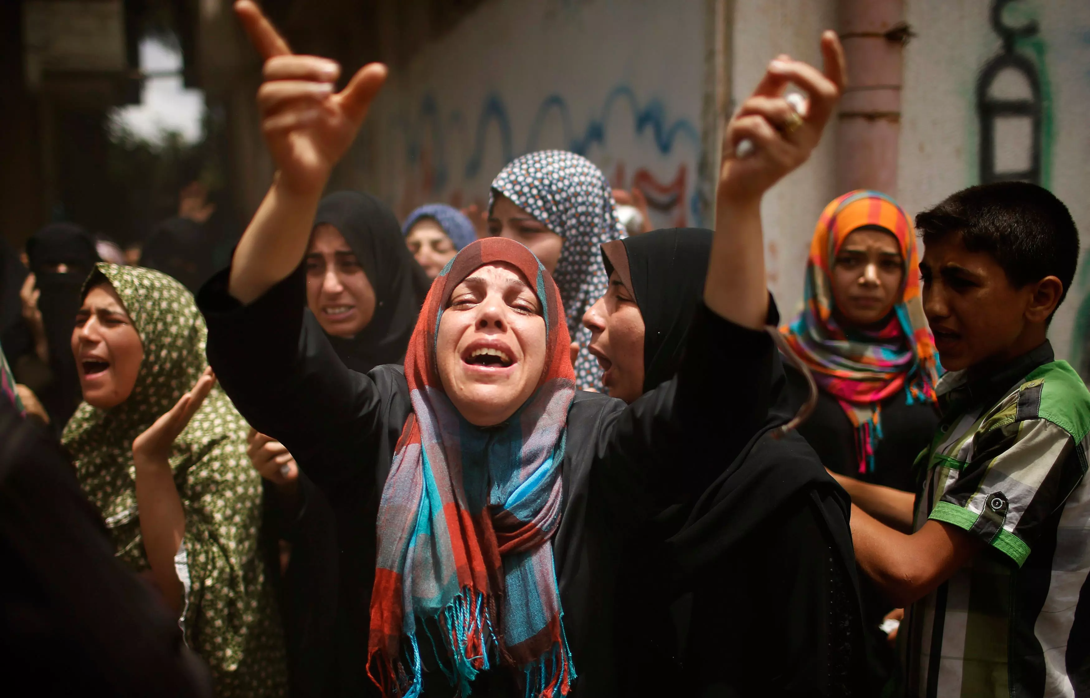 נשים פלסטיניות בעזה במהלך אחת ההלוויות של הרוגי המבצע