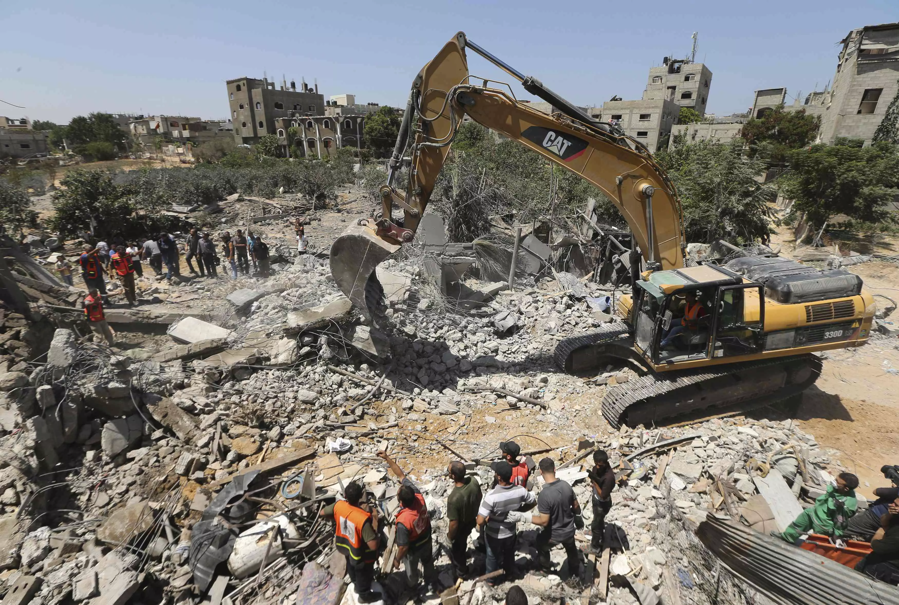 ישראל מאפשרת הכנסת סיוע. הריסות ברצועת עזה לאחר הפצצה של צה"ל במהלך "צוק איתן"