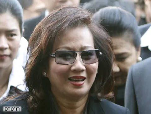 פוג'מרן צ'ינאוואט, אשתו של ראש הממשלה טקסין צ'ינאוואט התאילנדי המודח שבה לתאילנד לאחר גלות של שנה