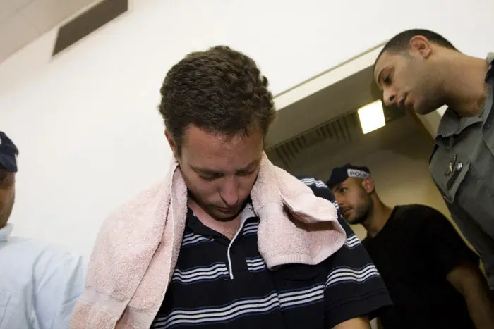התאבד במהלך טיול בחצר הכלא. אסף גולדרינג בהארכת מעצרו, אוגוסט 2009