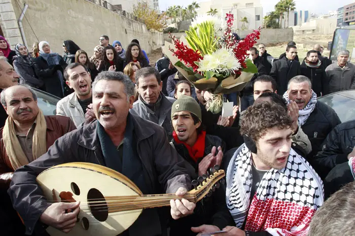 הפגנות הזדהות בעמאן עם המהפיכה בתוניסיה. דווקא המעמד הבינוני היה הראשון לצאת לרחובות