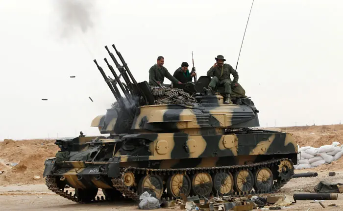 "כוחות קדאפי ממשיכים להתקדם למרות הפסקת האש"