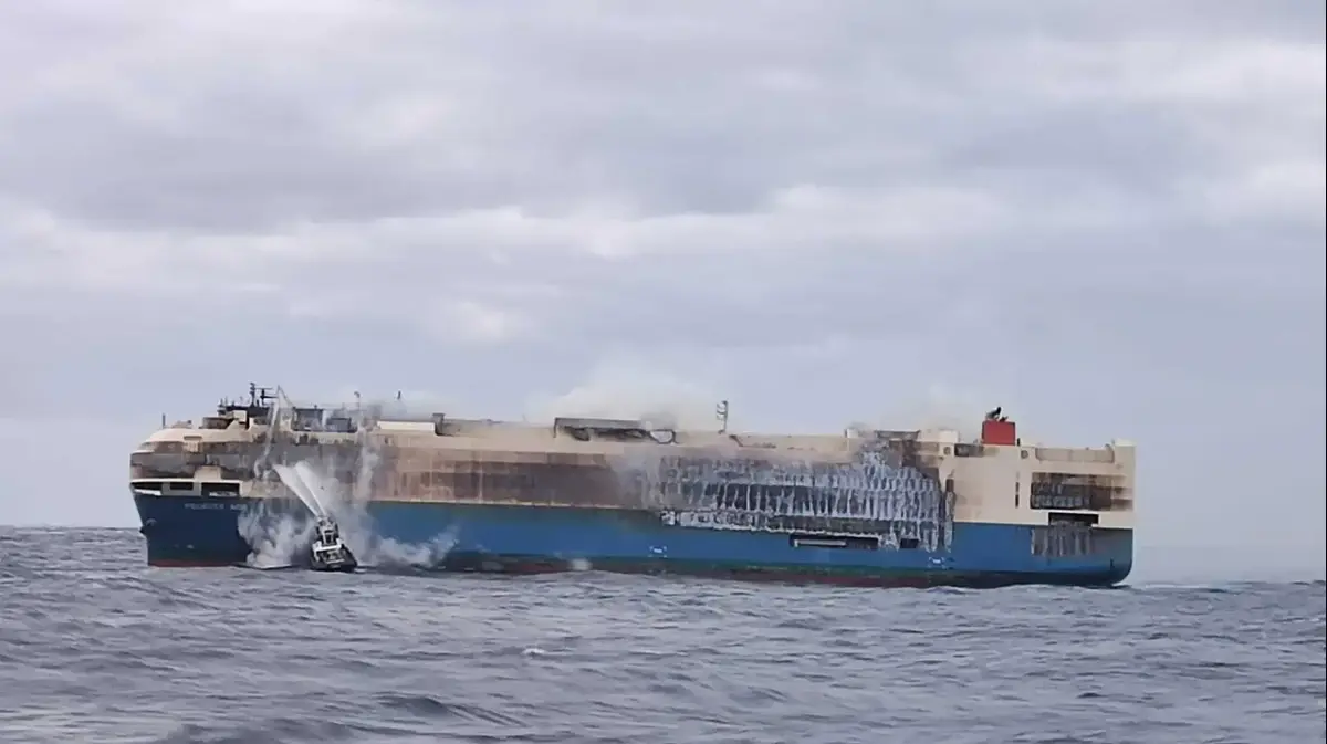 The car went the cargo ship carrying thousands of luxury cars sank