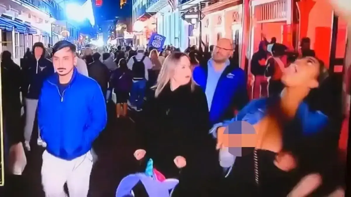 During the broadcast of the football final the fan revealed her chest