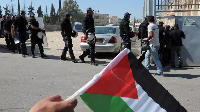 שוטרים פלסטינים לנפי המשחק של פלסטין נגד בחריין