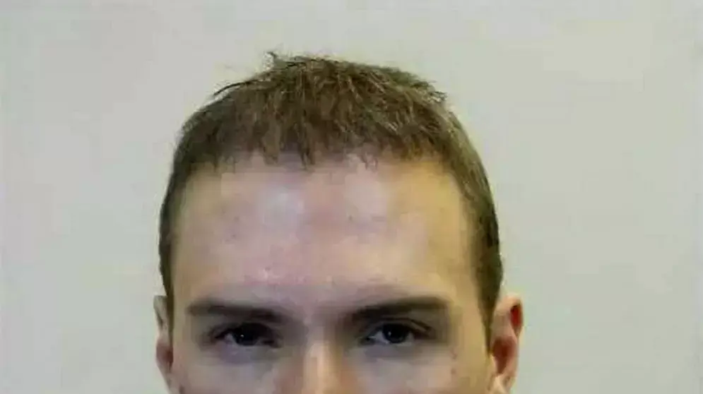 לוקה רוקו מניוטה, כוכב פורנו קנדי שרצח וביתר סטודנט סיני, לאחר מעצרו בברלין, יוני 2012