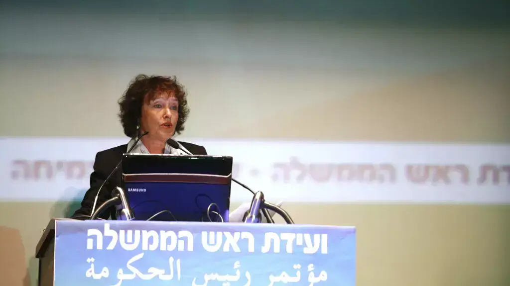 הנגידה קרנית פלוג  בוועידת רוה"מ, אוקטובר 2013