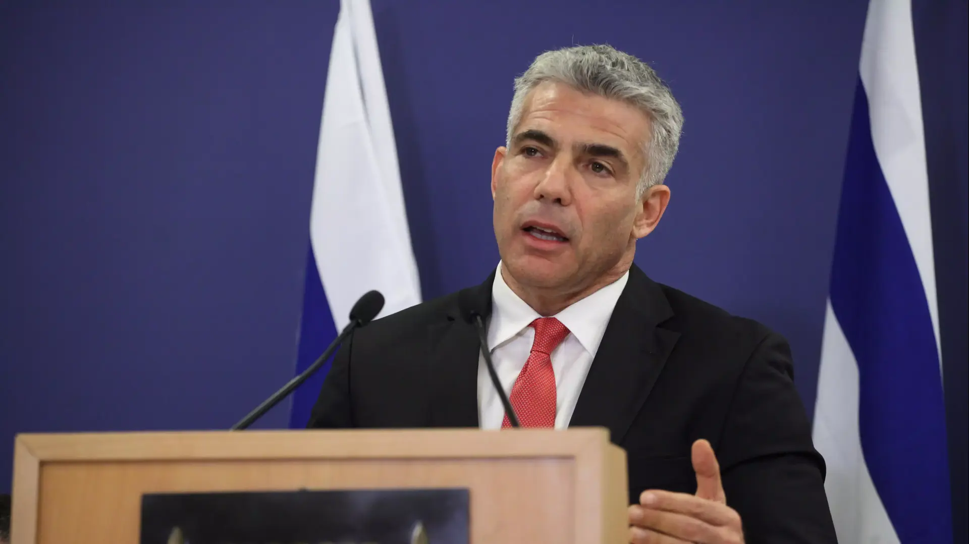 יאיר לפיד במסיבת עיתונאים במשרד האוצר. נובמבר 2013