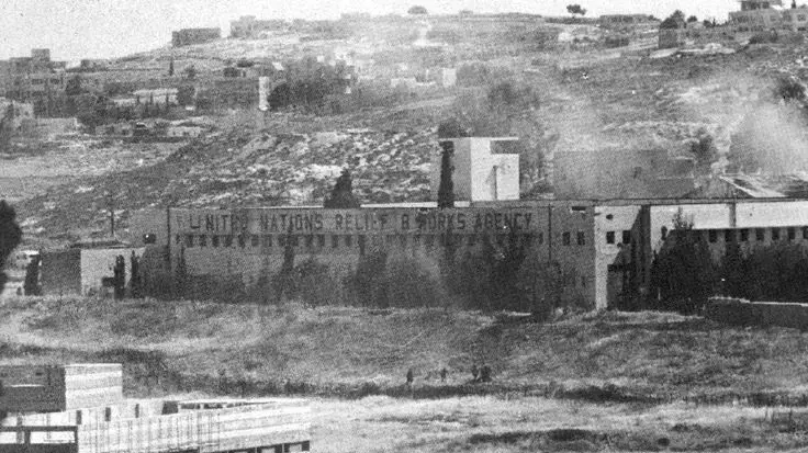 הקרב על בית הספר לשוטרים מבט משיכוני שכונת שמואל הנביא, ברקע בנייני שכונת שיח' ג'ראח