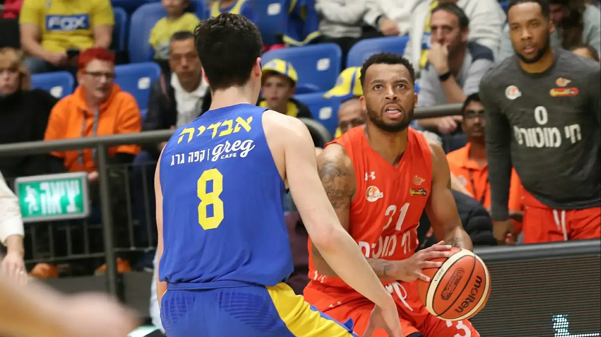 דקוואן קוק שחקן עירוני נס ציונה מול דני אבדיה שחקן מכבי תל אביב