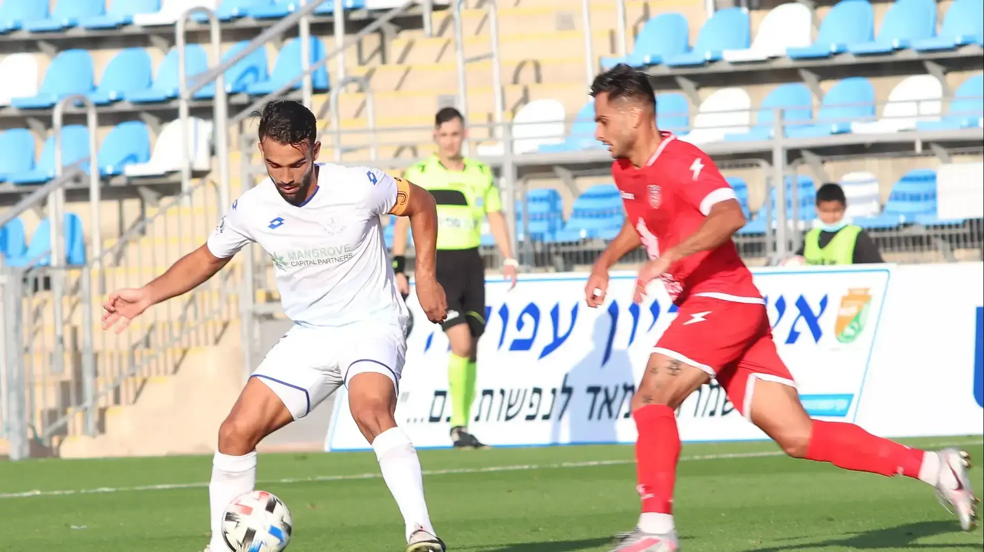 תימור אביטן שחקן הפועל איכסל (מימין) מול רם לוי שחקן הפועל פתח תקוה תימור אביטן שחקן הפועל איכסל (מימין) מול רם לוי שחקן הפועל פתח תקוה