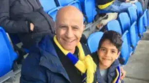 אורי סלימאן עם הנכד במשחק כדורגל
