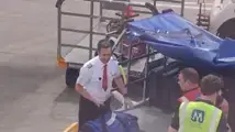 טייס אדלווייס אייר מעמיס מזוודות לטיסה באדינבורו