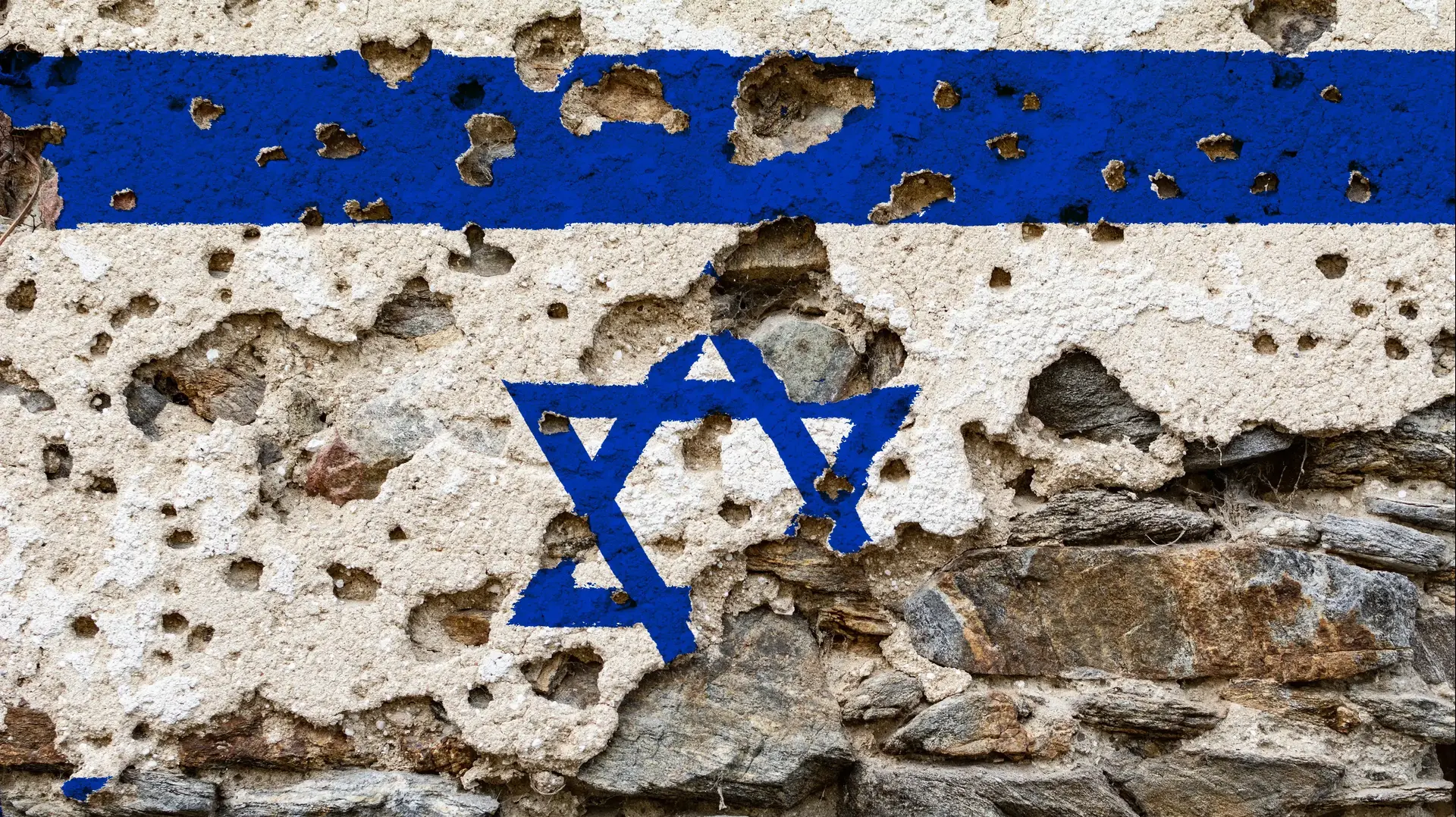 דגל ישראל על קיר מפורק עם חורים