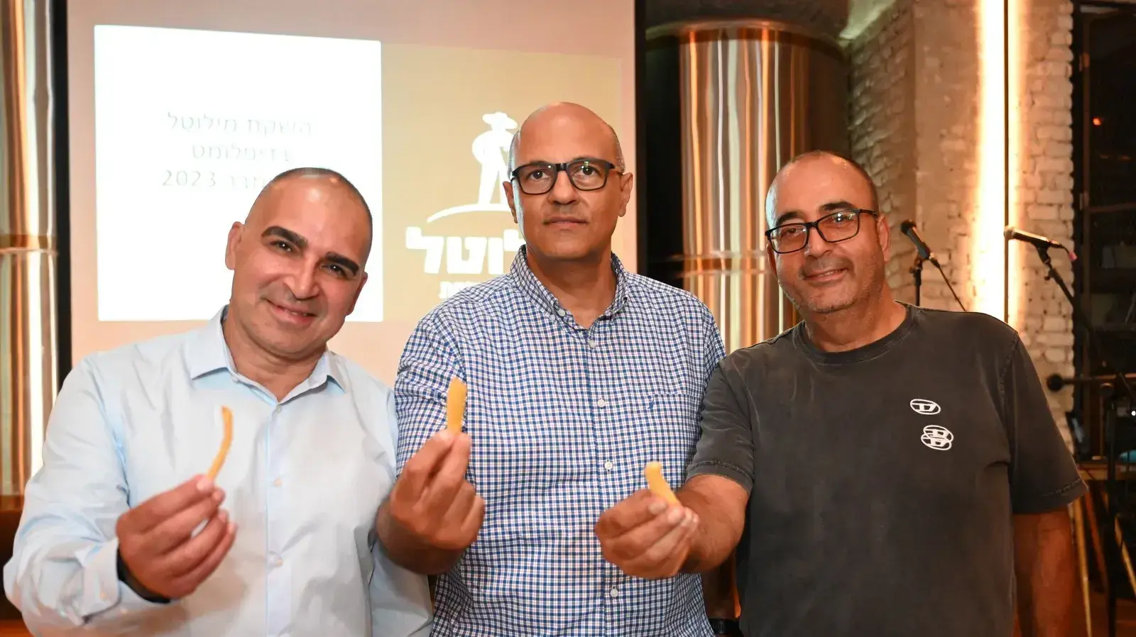 ג'ואד אגברייה בעלים מילוטל, יינון בן ענת מנכ"ל דיפלומט ישראל, אבי לוי מנהל הפעילות האסטרטגיה והפיתוח העסקי מילוטל בטקס השקה