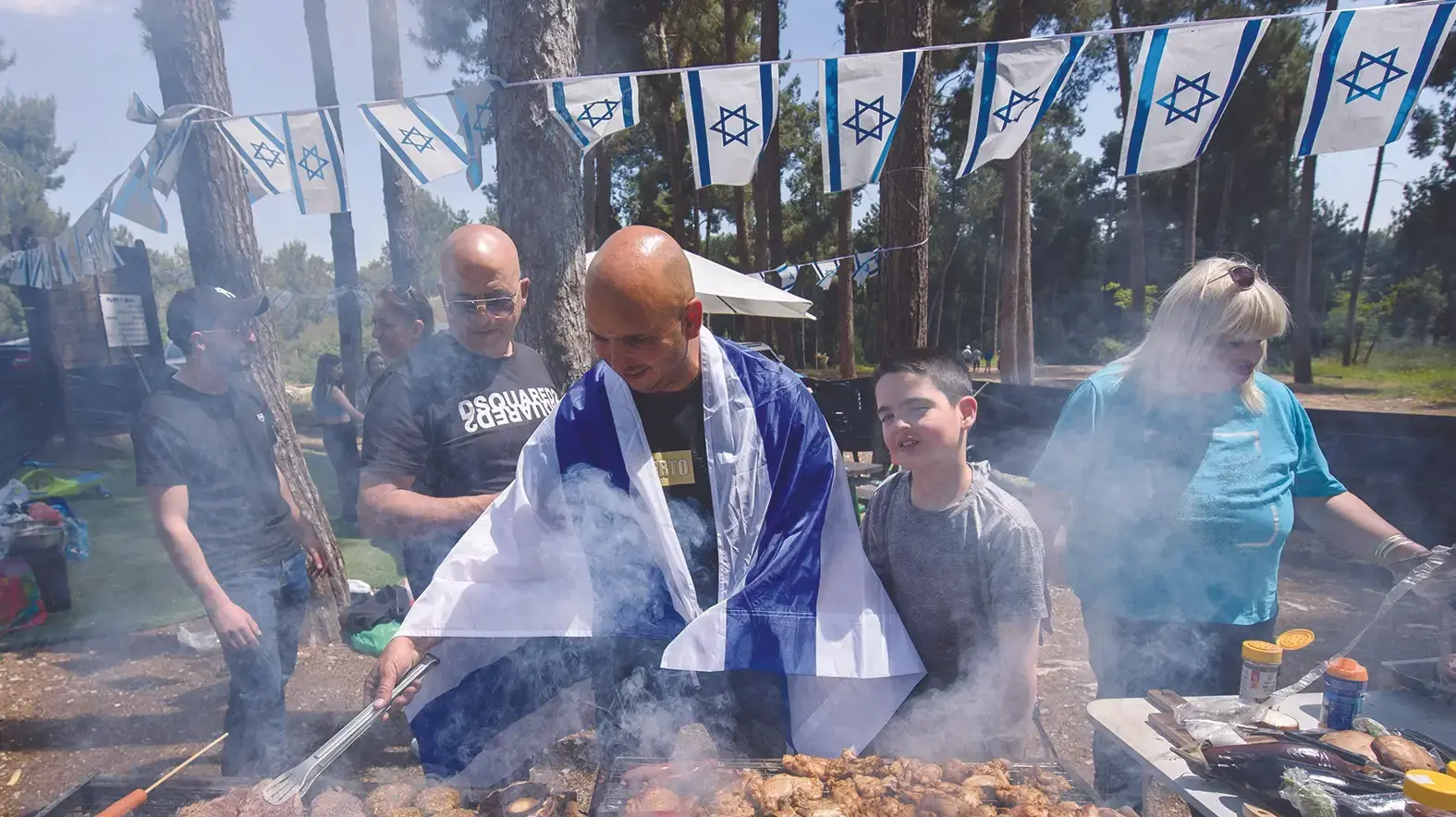 על האש