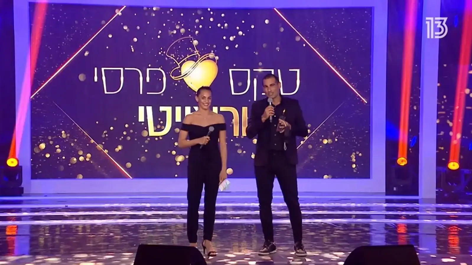 הטניסאי אנדי רם והמתעמלת האולימפית לינוי אשרם באירוע התרמה טלוויזיוני של וראייטי.