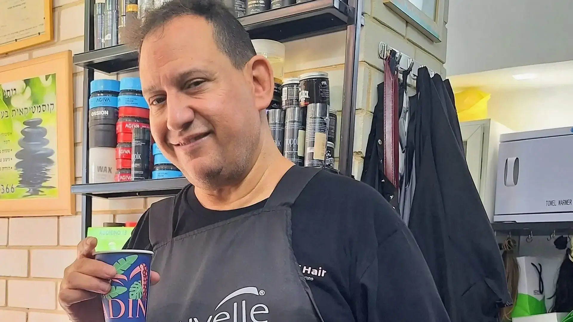 אילן לזר בן שמעון אלמליח הנאשם במעשה מגונה בלקוחה