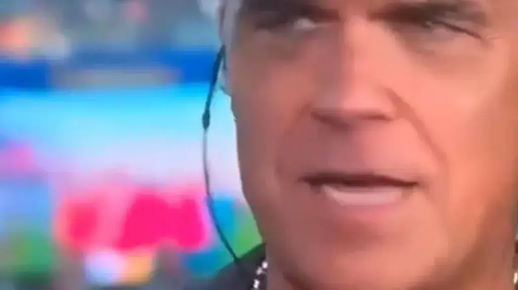 רובי וויליאמס והחומר החשוד שנפל מהאף שלו במהלך שידור חי בגמר המונדיאל