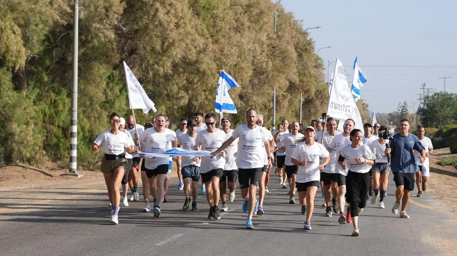 עשרות בני משפחות שכולות הגיעו ביום שישי לניר עוז לאימון המשותף הרביעי לקראת מרתון שיקגו