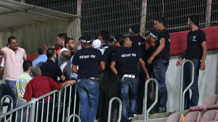 מהומה ביציע אוהדי בני סכנין