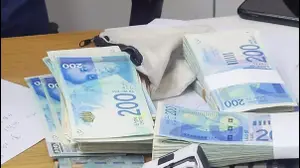 שטרות שנתפסו במהלך פשיטת הענק בהרט