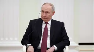 נשיא רוסיה ולדימיר פוטין עם מחמוד עבאס במוסקבה, רוסיה, 22 בינואר 2026