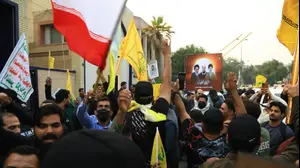 תומכי המיליציות השיעיות וחיזבאללה בבגדאד, עיראק, 5 בדצמבר 2025