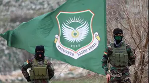 לוחמים כורדים איראנים ממפלגת החופש של כורדיסטן (PAK) במהלך אימון בבסיס בפאתי ארביל, עיראק, 12 בפברואר 2026