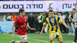 שחקן הפועל תל אביב, דורון ליידנר, מול שחקן מכבי תל אביב, אושר דוידה