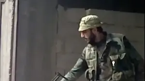 קצין המודיעין הסורי אמג'ד יוסף בעת ביצוע הטבח בשכונת תדמון, דמשק, סוריה, 2013