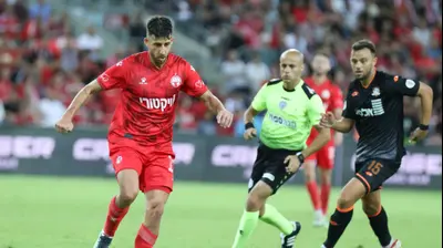 דור מיכה, קשר הפועל באר שבע. דני מרון