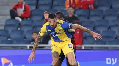 ניר ביטון שחקן מכבי תל אביב. דני מרון