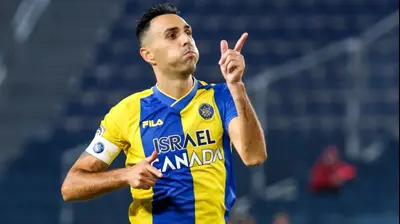 ערן זהבי שחקן מכבי תל אביב חוגג שער. דני מרון