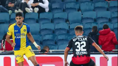 יונתן כהן שחקן מכבי תל אביב חוגג שער. דני מרון