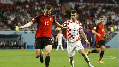 שחקן נבחרת בלגיה תומא מונייה מול שחקן נבחרת קרואטיה איבן פרישיץ'. רויטרס