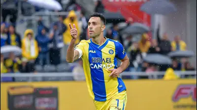 ערן זהבי, שחקן מכבי תל אביב חוגג. אריאל שלום