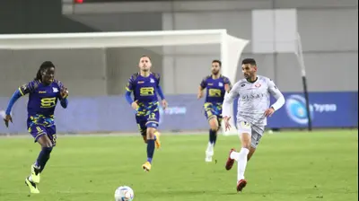 ריצ'רד בואטנג, שחקן מכבי בני ריינה לצד רון אונגר, שחקן הפועל חדרה. שלומי גבאי