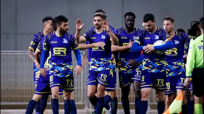 שחקני מכבי בני ריינה חוגגים. מאור אלקסלסי