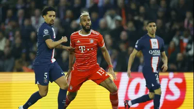 שחקן פריז סן ז'רמן מרקיניוס מול שחקן באיירן מינכן אריק מקסים שופו מוטינג. רויטרס