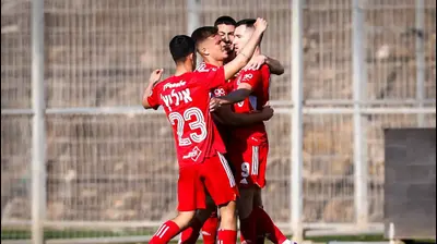 שחקני הפועל תל אביב חוגגים. מאור אלקסלסי