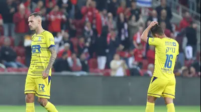 יניב בריק לצד לוקאס שפנדלהופר מכבי בני ריינה. דני מרון