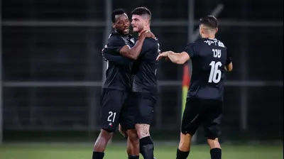 שחקני עירוני קרית שמונה חוגגים עם סנין סבאי. מאור אלקסלסי