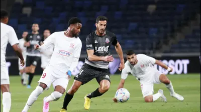 אנז' פרדי פלומן שחקן בני סכנין לפני חאתם עבד אלחמיד שחקן הפועל חיפה. קובי אליהו