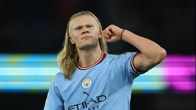 ארלינג הולאנד שחקן מנצ'סטר סיטי חוגג שער. רויטרס