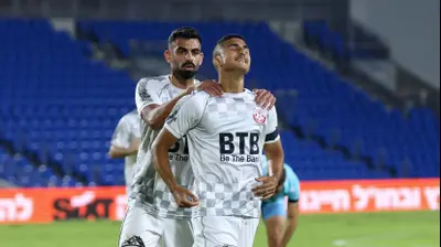 שחקני הפועל חדרה, אלעד מדמון, איציק שולמייסטר. דני מרון