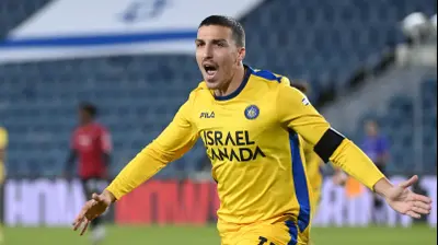 אושר דוידה שחקן מכבי תל אביב חוגג שער. ברני ארדוב